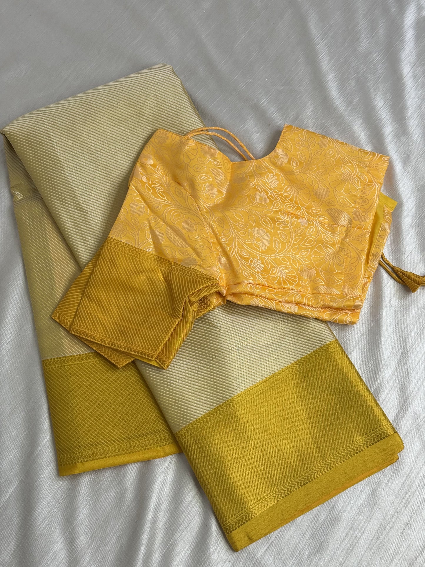 Light Yellow Tissue Saree With Stitched Blouse