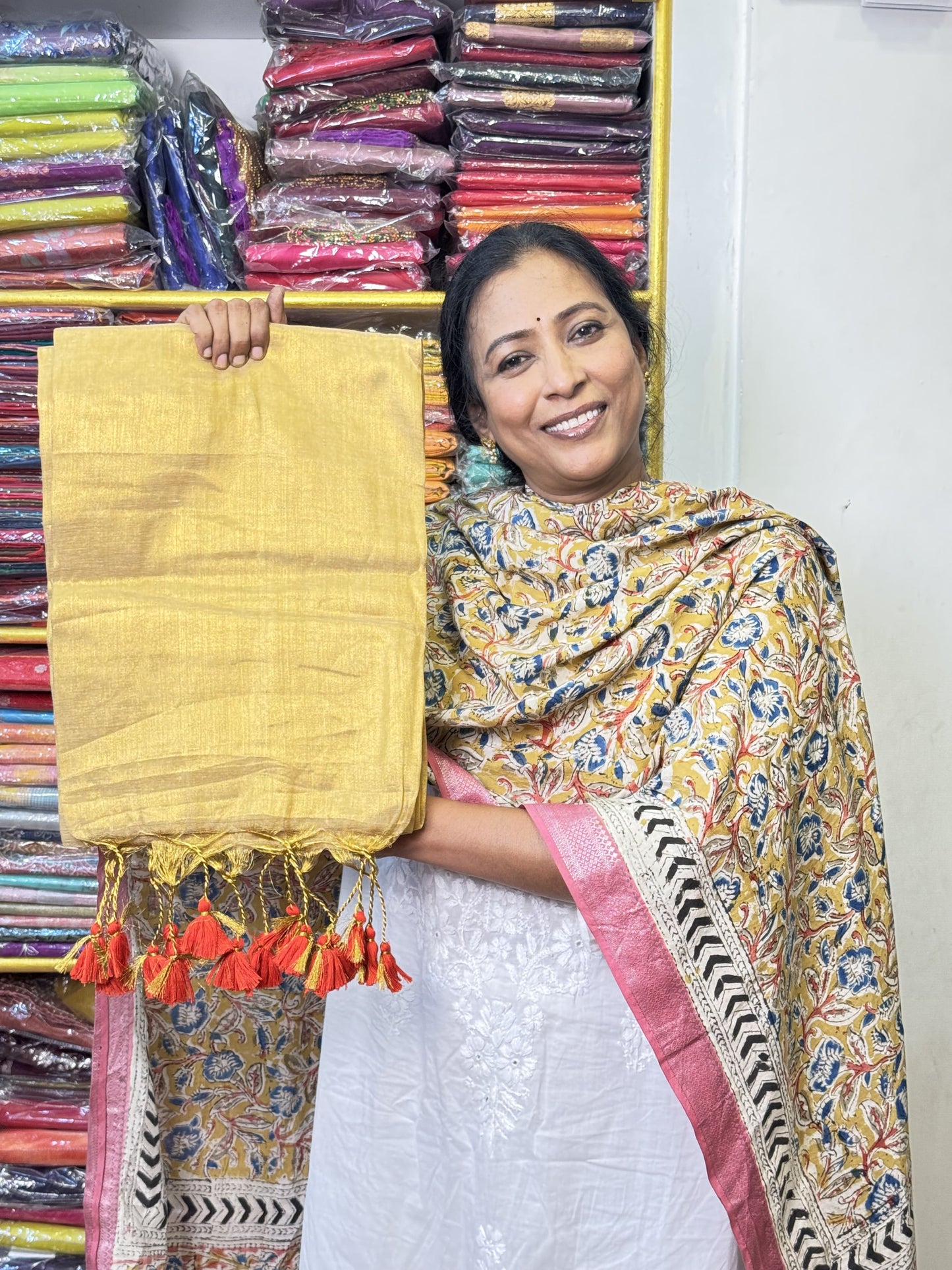 Golden with Red Tassels Plain Tissue Saree