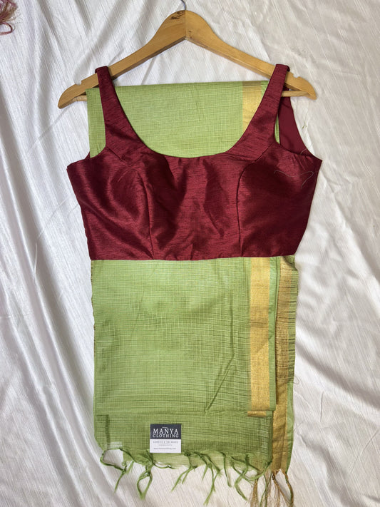 Pastel Green Cotton Saree With Sleeveless Blouse